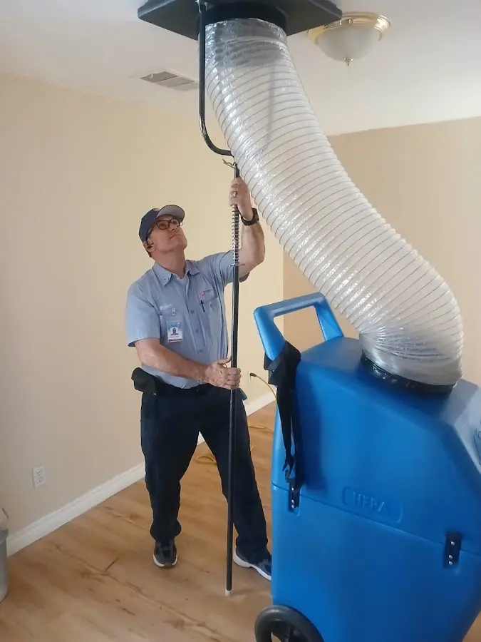 HVAC Installation technician using HEPA equipment in Melissa